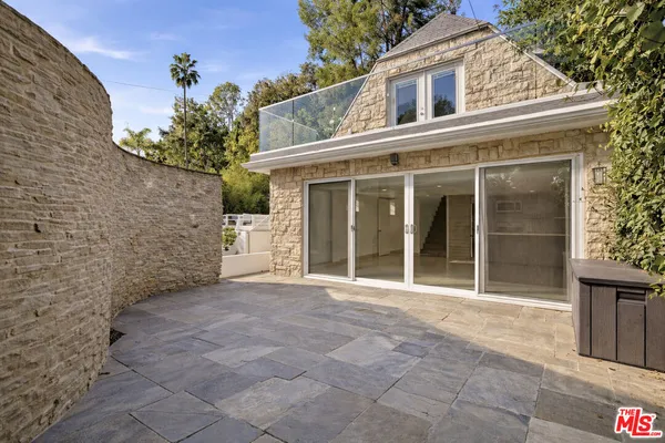 a view of a outdoor space with a patio