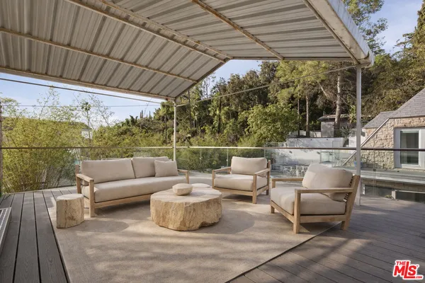 a house view with a outdoor space