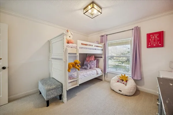 a view of a building with car parked