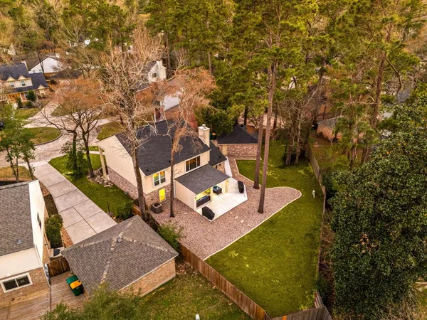 $600,000 | 57 Fire Flicker Place, The Woodlands, TX 77381