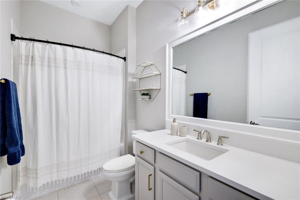 11200 Canal Grande Drive Fort Myers, FL 33913 - Photo 21 of 29 a bathroom with a sink and a toilet