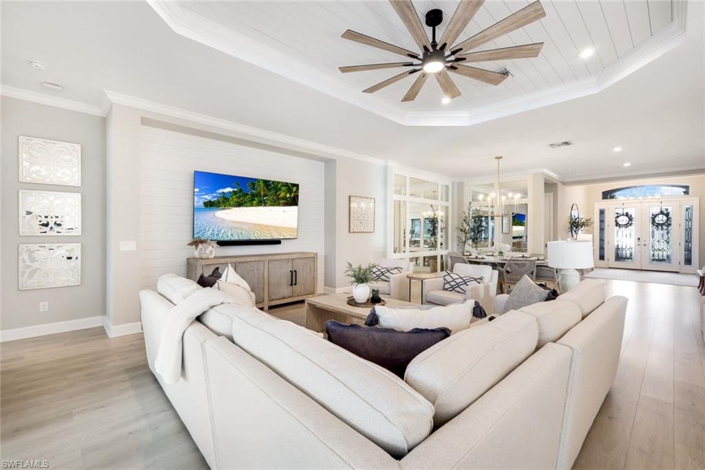 11200 Canal Grande Drive Fort Myers, FL 33913 - Photo 4 of 29 a living room with furniture and a large window