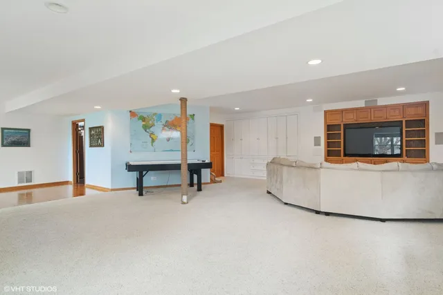 a living room with furniture and a couch