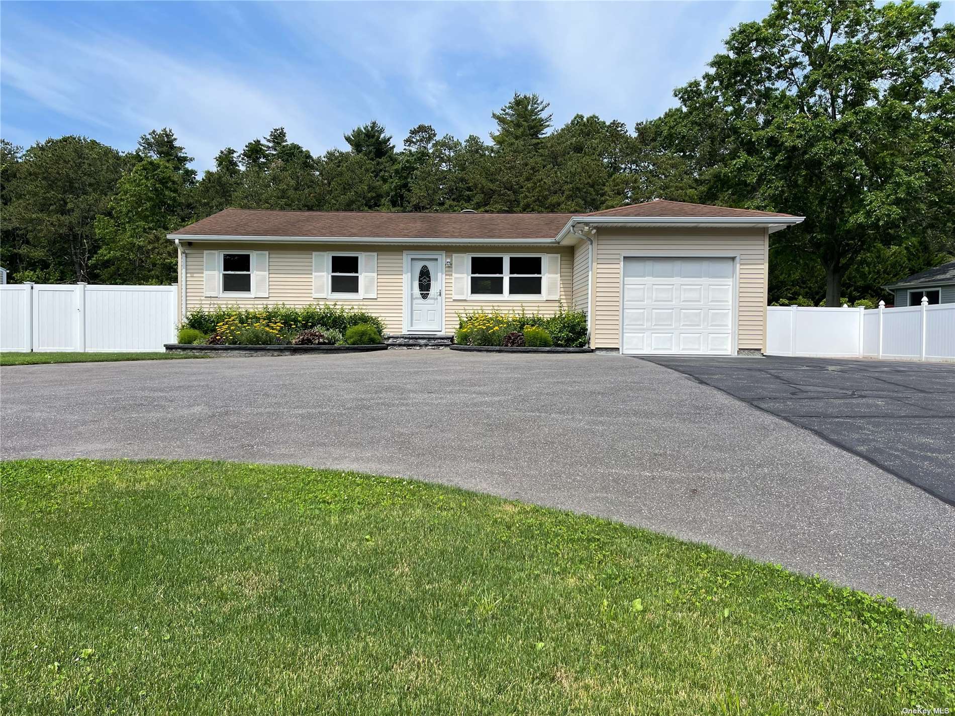 488 Nichols Road Hauppauge, NY 11788 - Photo 1 of 1 a front view of house with yard and trees in the background