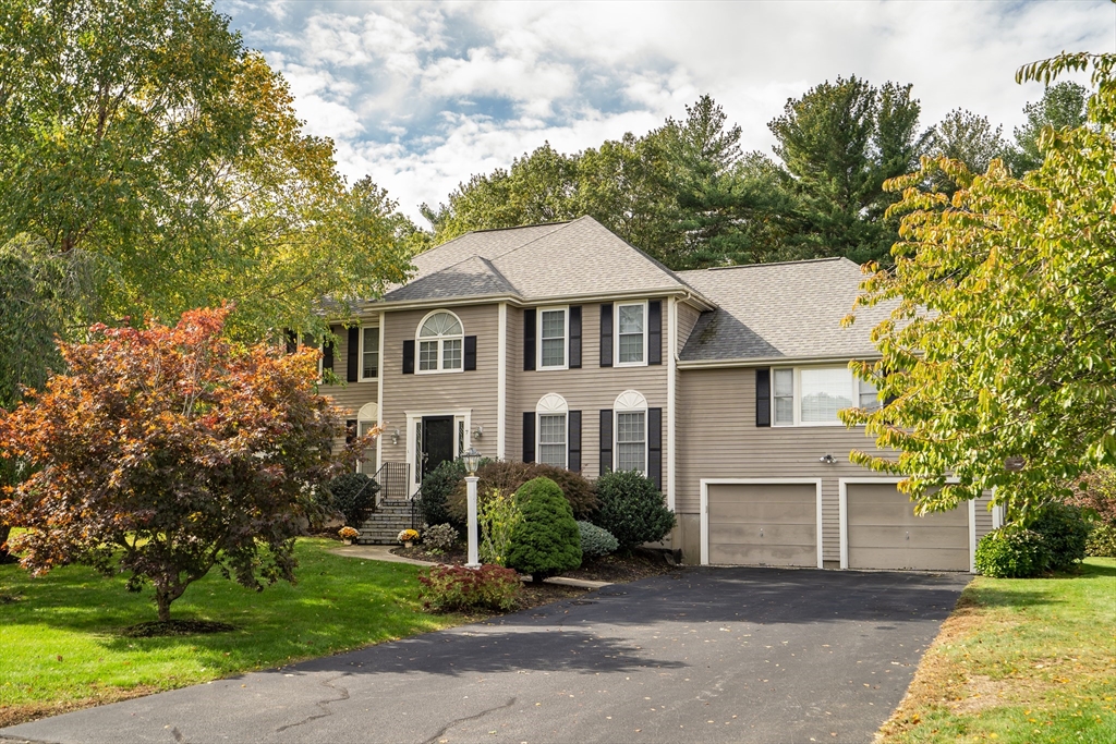 7 Stouffer Circle Andover, MA 01810 - Photo 1 of 37 a front view of a house with a yard