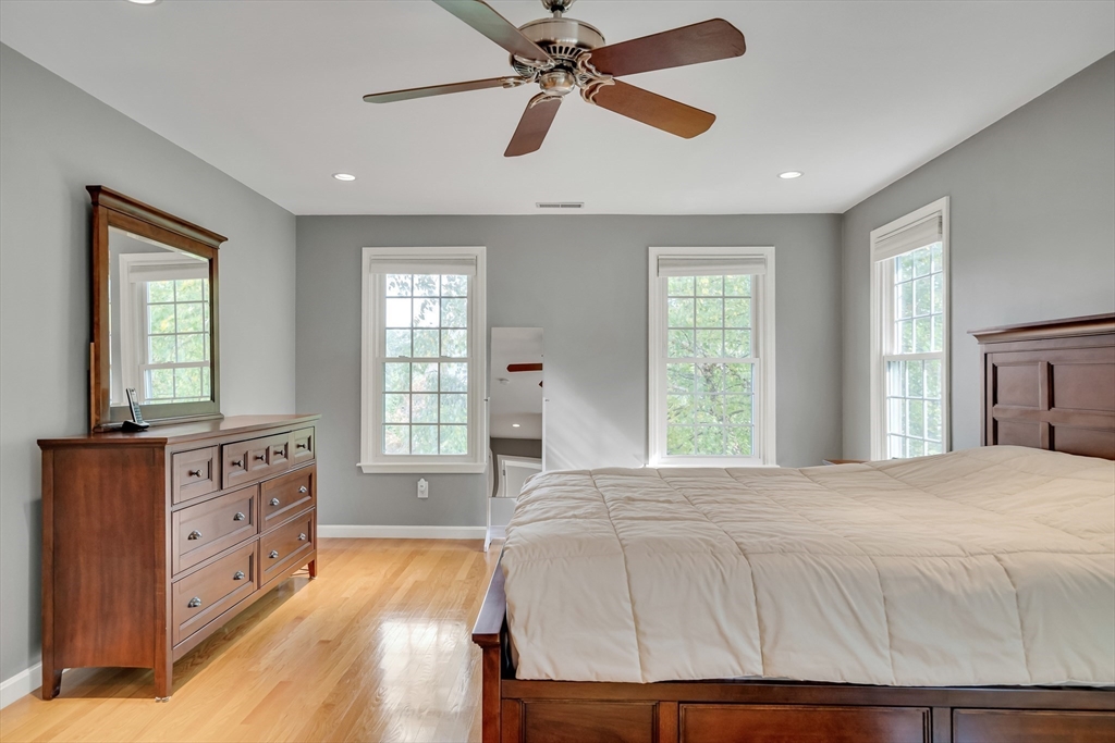 7 Stouffer Circle Andover, MA 01810 - Photo 15 of 37 a spacious bedroom with a bed and a dresser