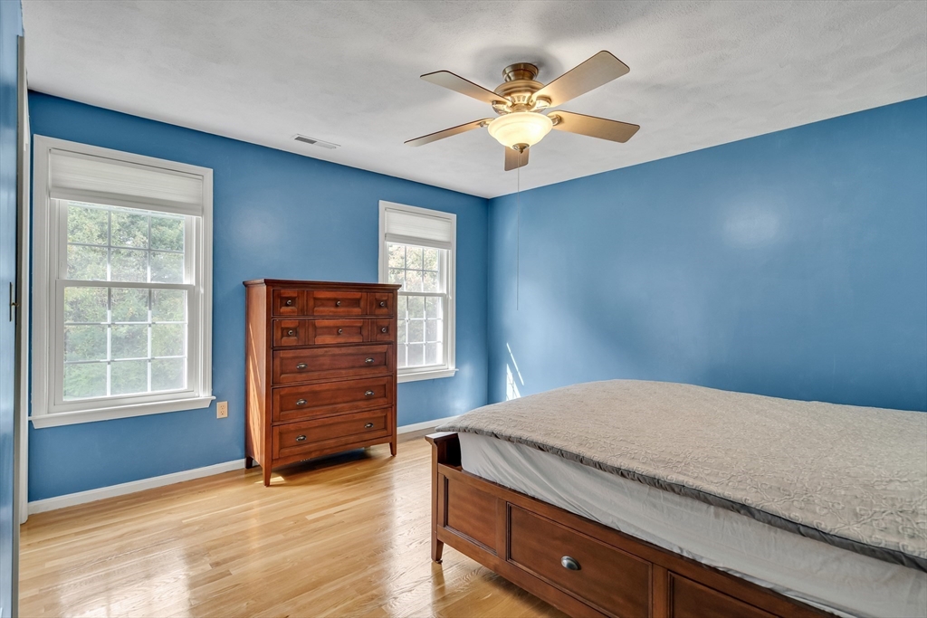 7 Stouffer Circle Andover, MA 01810 - Photo 17 of 37 a bedroom with a bed and a dresser