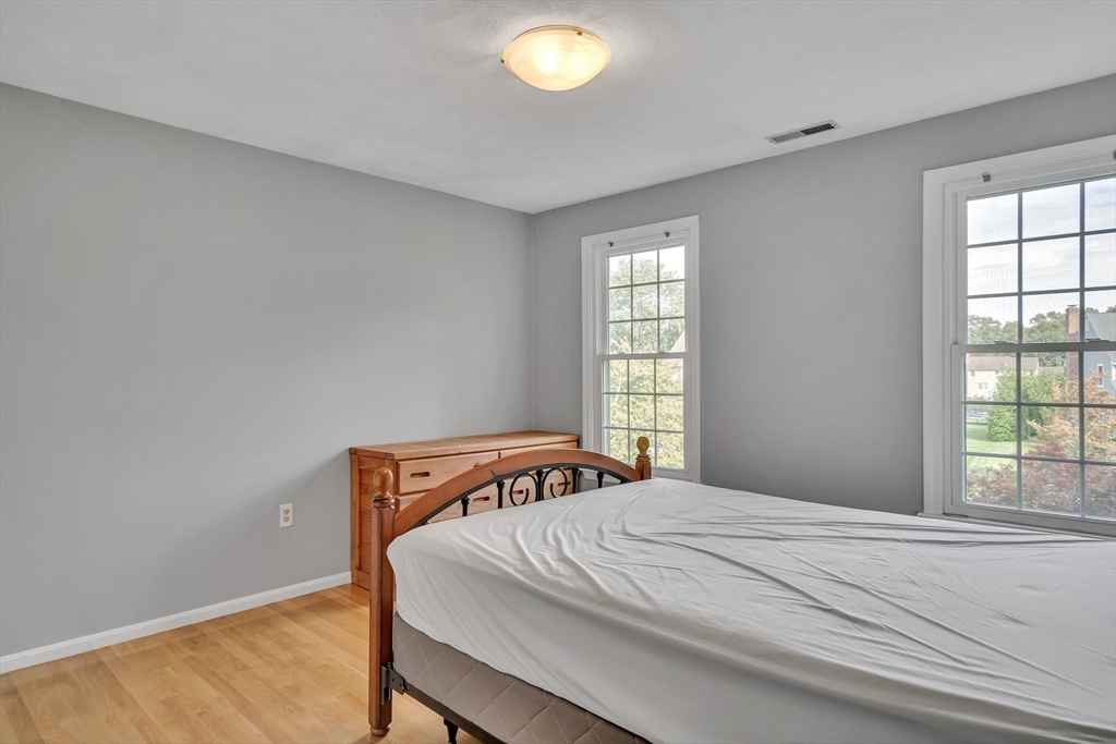 7 Stouffer Circle Andover, MA 01810 - Photo 19 of 37 a bedroom with a bed and a window