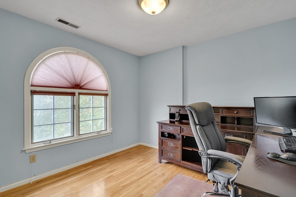 7 Stouffer Circle Andover, MA 01810 - Photo 23 of 37 a view of a workspace with furniture and a window