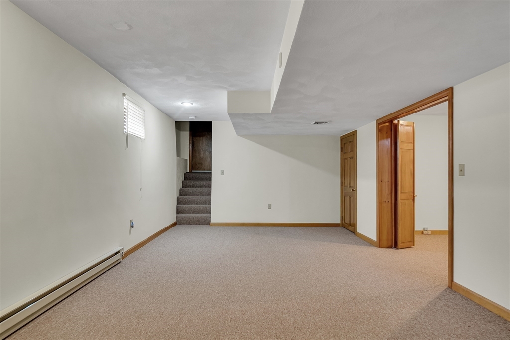 7 Stouffer Circle Andover, MA 01810 - Photo 29 of 37 a view of hallway with stairs