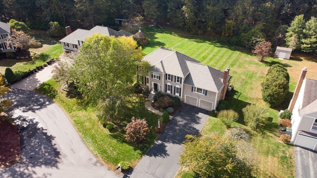 7 Stouffer Circle Andover, MA 01810 - Photo 33 of 37 a view of a house with a yard and garden