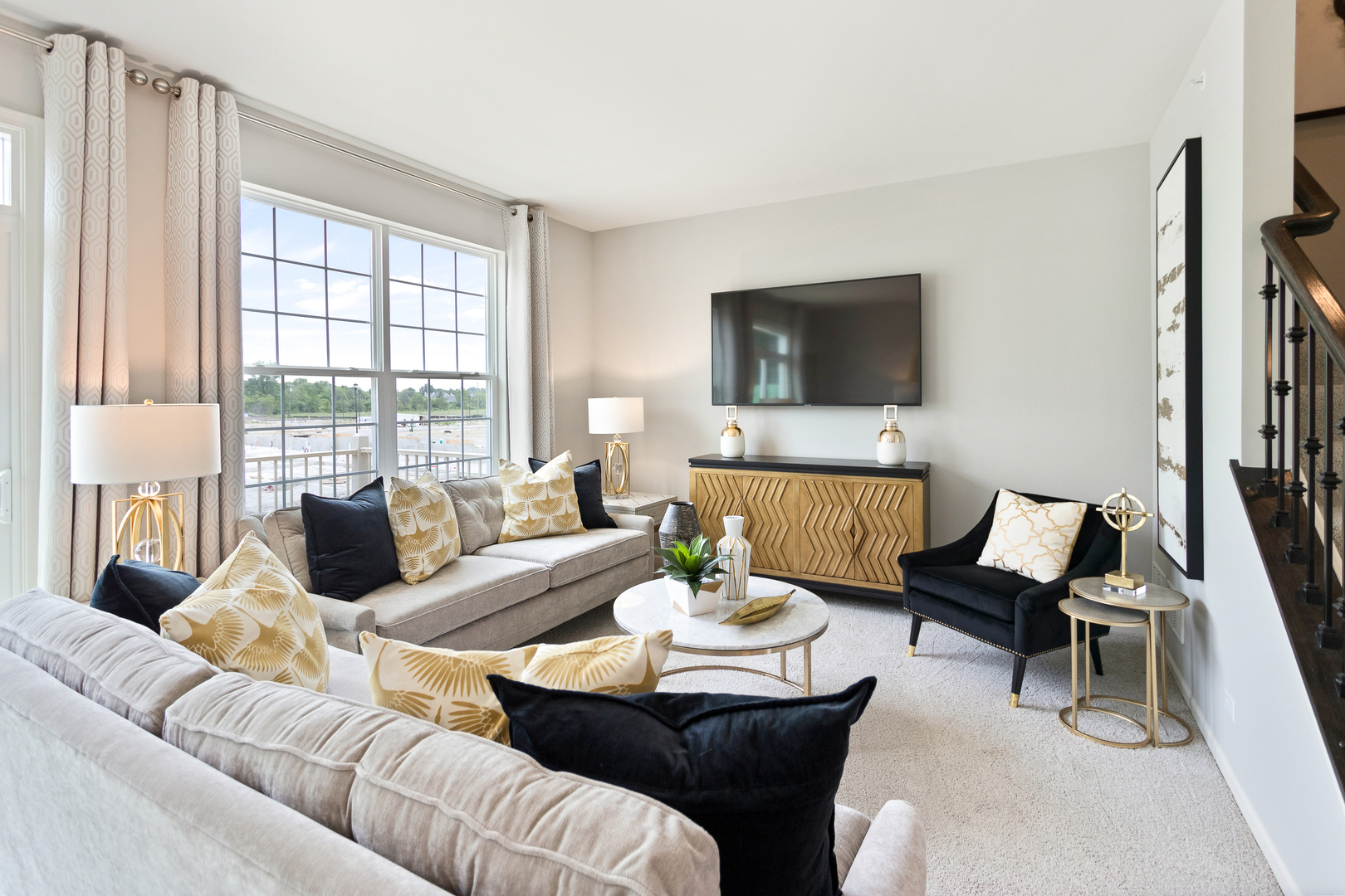 1654 BENTZ Way Batavia, IL 60510 - Photo 5 of 27 a living room with furniture and a flat screen tv