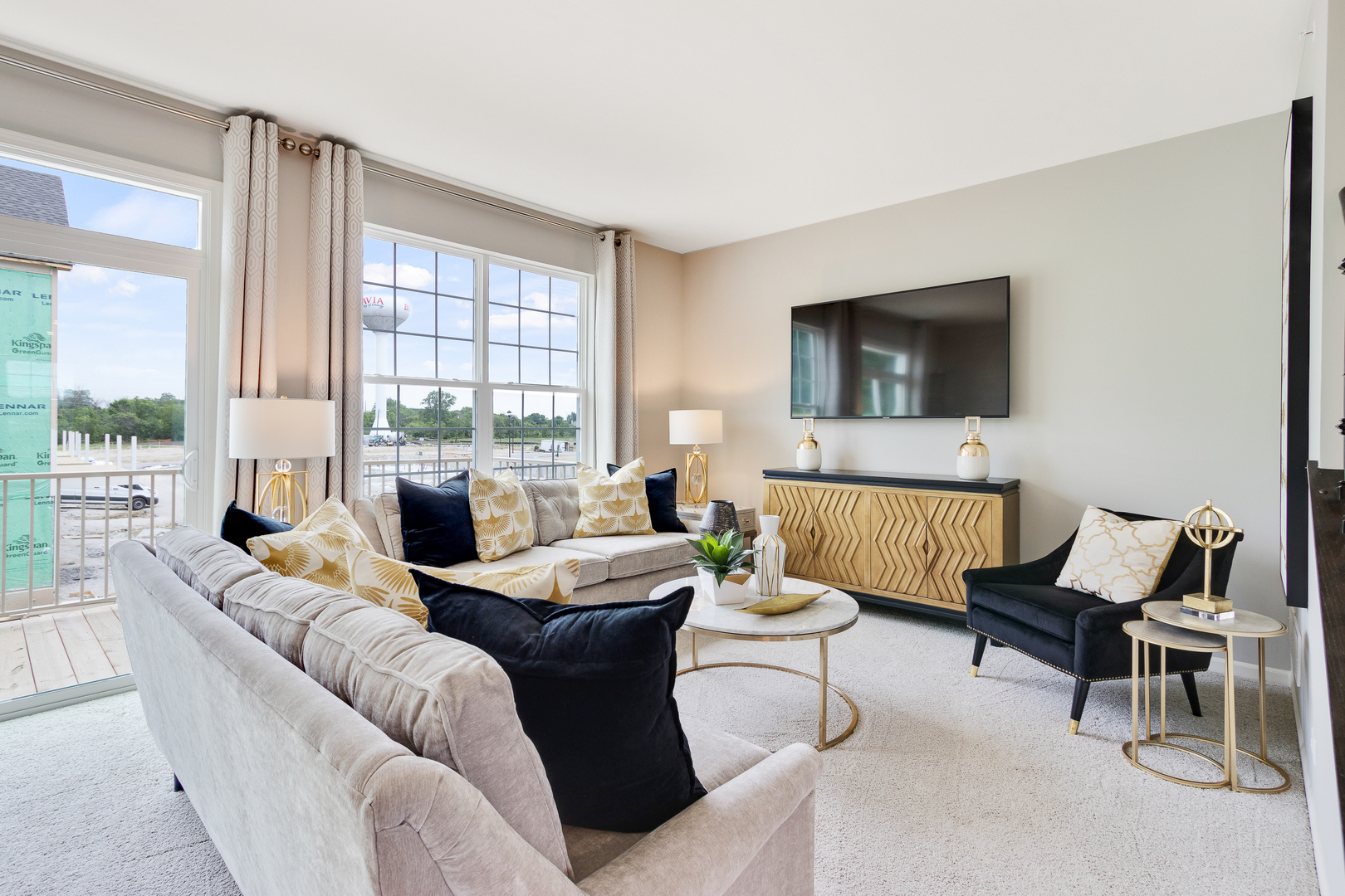 1654 BENTZ Way Batavia, IL 60510 - Photo 6 of 27 a living room with furniture floor to ceiling window hardwood floor and a flat screen tv