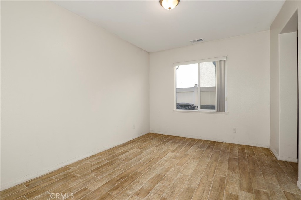 3437 Nature Trail Court Perris, CA 92571 - Photo 23 of 49 an empty room with a window