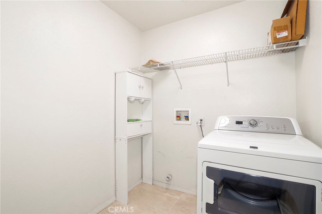 3437 Nature Trail Court Perris, CA 92571 - Photo 41 of 49 a utility room with dryer and washer