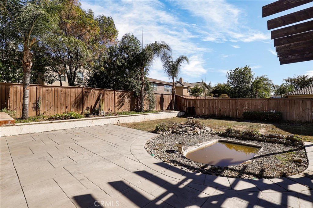 3437 Nature Trail Court Perris, CA 92571 - Photo 43 of 49 a view of a chairs and table in the patio