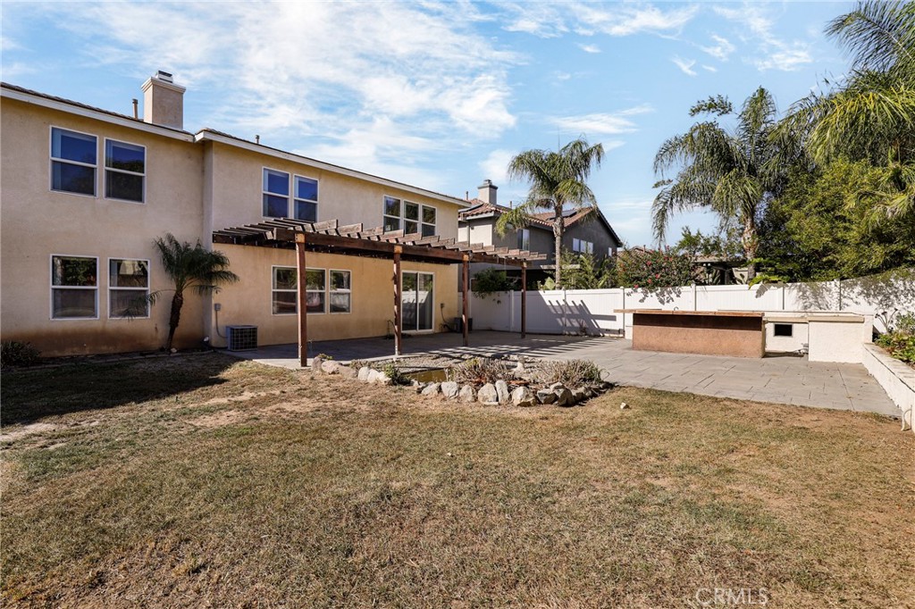 3437 Nature Trail Court Perris, CA 92571 - Photo 45 of 49 a house with trees in front of it