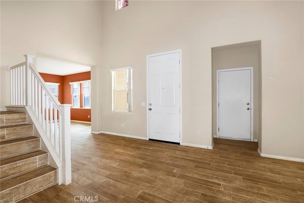 3437 Nature Trail Court Perris, CA 92571 - Photo 7 of 49 a view of an entryway with staircase