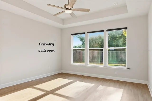 a view of a livingroom with wooden floor