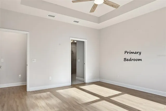 a bathroom with a tub a sink shower and mirror