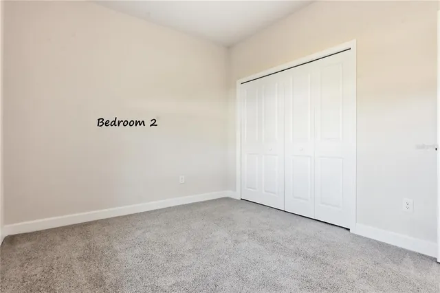 an empty room with a empty space and window