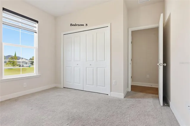 a bathroom with a bathtub and a toilet