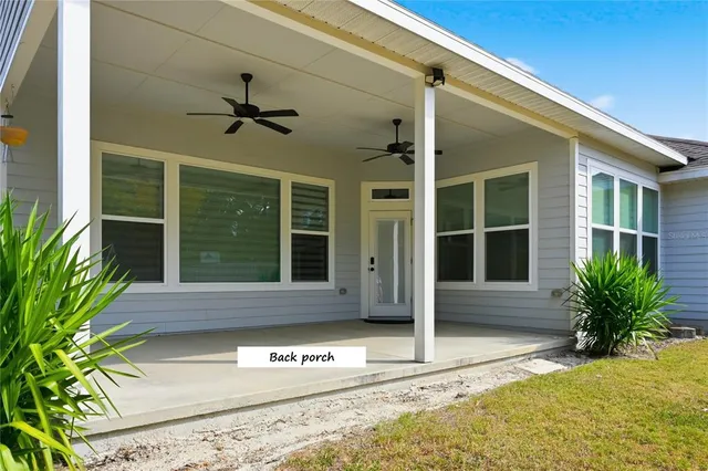a view of a house with a big yard