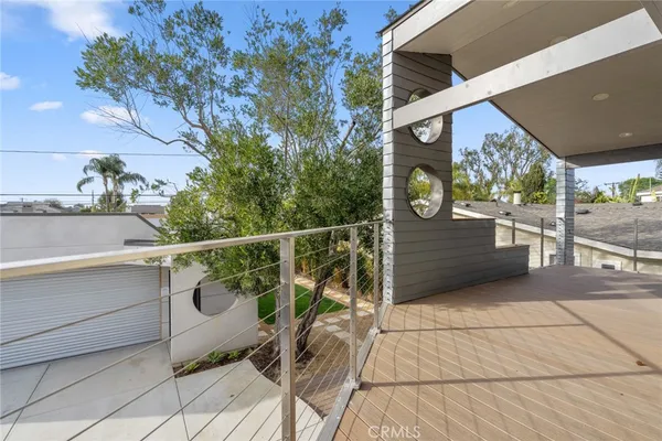 a view of a balcony with chairs
