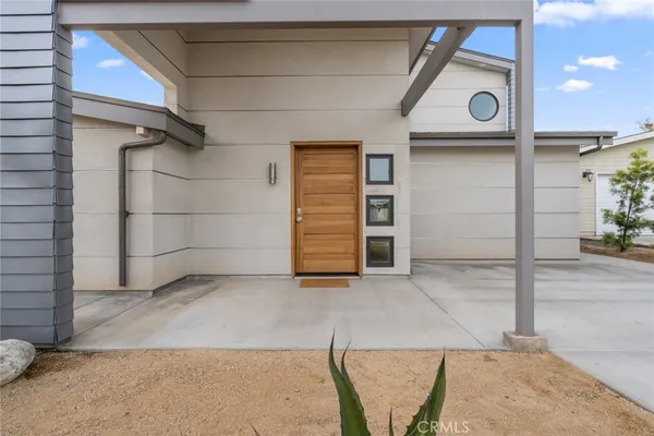 a view of a door and small space