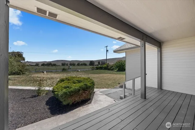 a view of a garden from a balcony