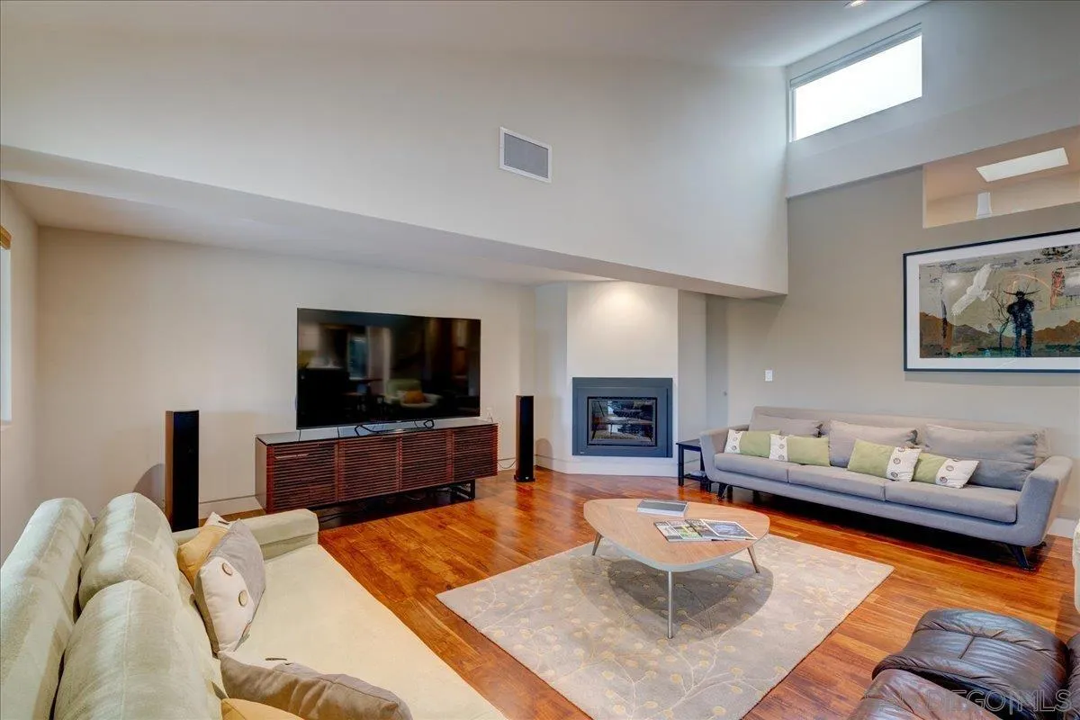 16117 Martincoit Road Poway, CA 92064 - Photo 15 of 50 a living room with furniture and a flat screen tv