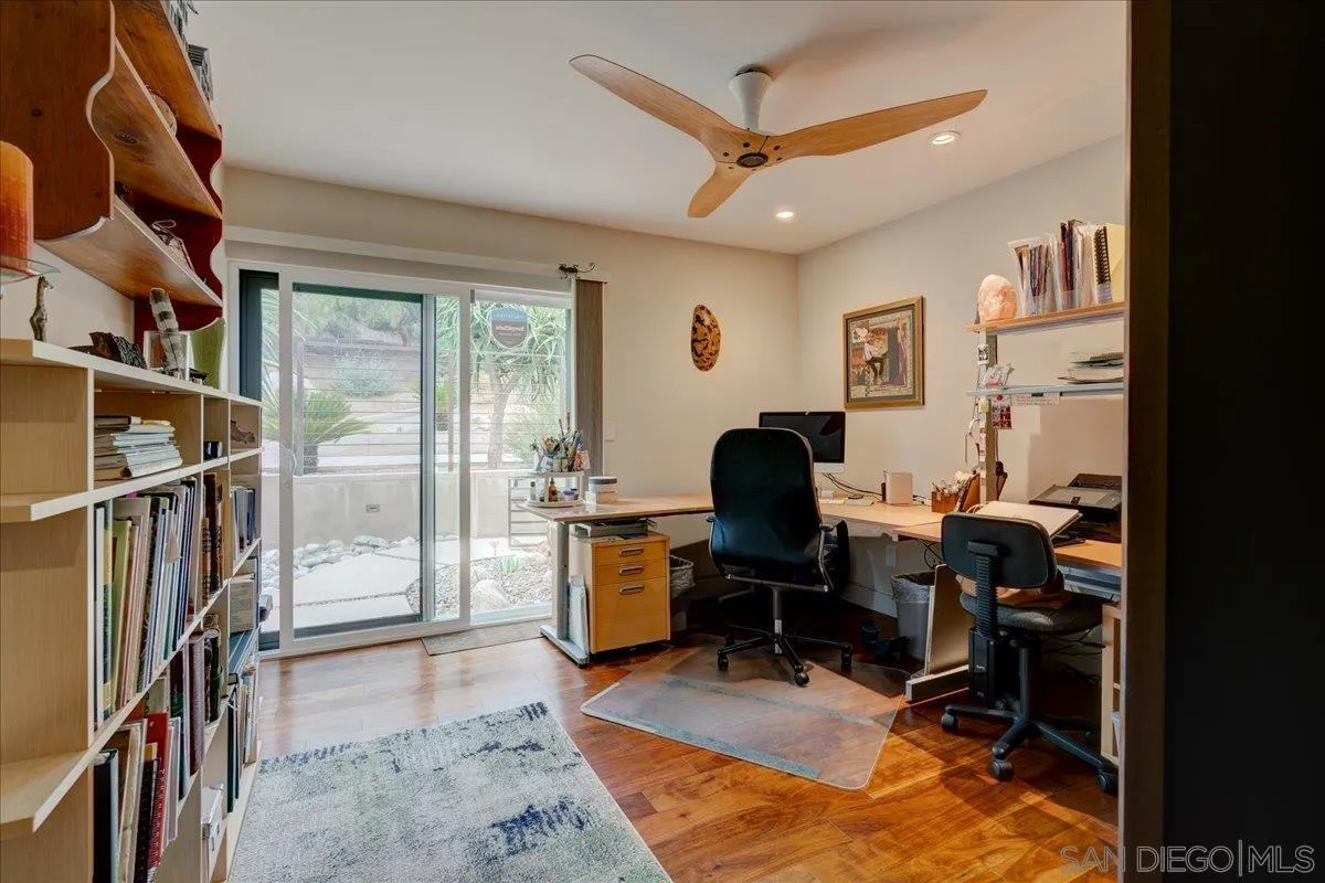 16117 Martincoit Road Poway, CA 92064 - Photo 23 of 50 a view of a workspace with furniture and a window