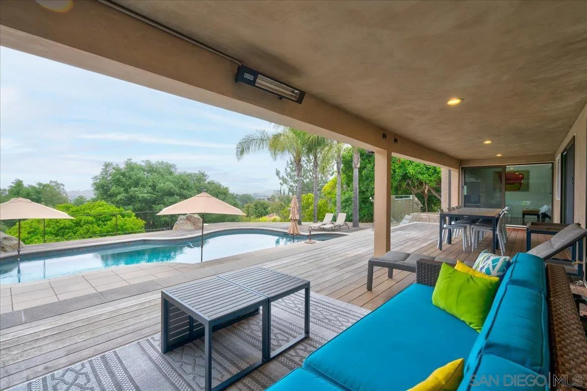 16117 Martincoit Road Poway, CA 92064 - Photo 33 of 50 a view of a chairs and table in patio with a barbeque grill