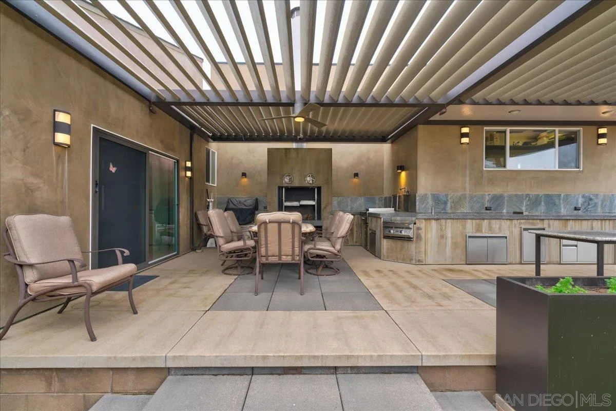 16117 Martincoit Road Poway, CA 92064 - Photo 38 of 50 a outdoor space with a large window and chairs