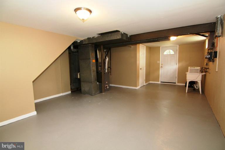 9114 Samoset Road Randallstown, MD 21133 - Photo 5 of 13 a view of an empty room