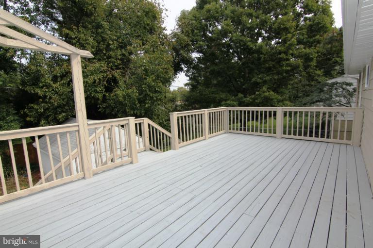 9114 Samoset Road Randallstown, MD 21133 - Photo 7 of 13 a view of a wooden deck