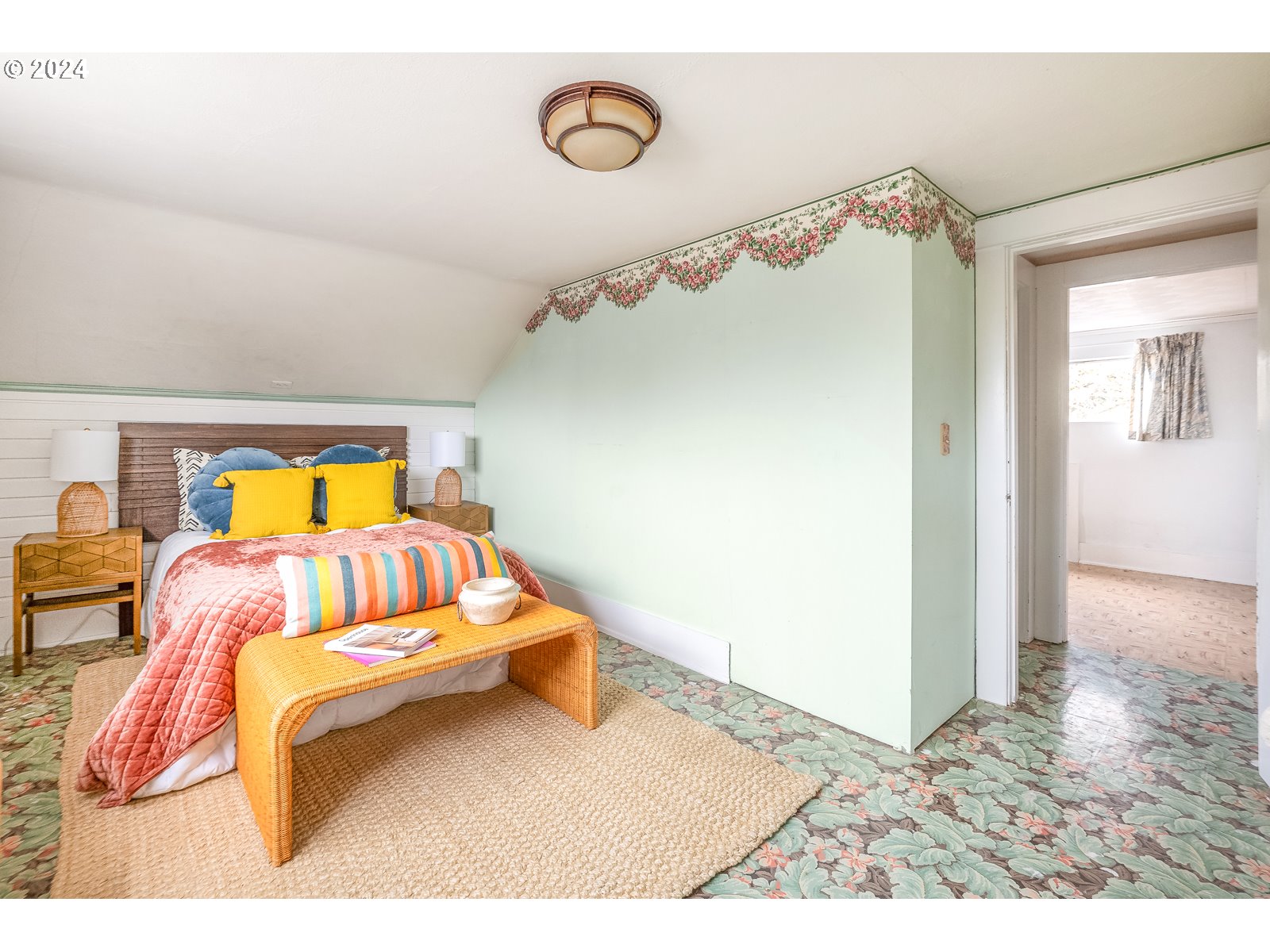 5232 Southeast Raymond Street Portland, OR 97206 - Photo 24 of 39 a bedroom with a bed and a table