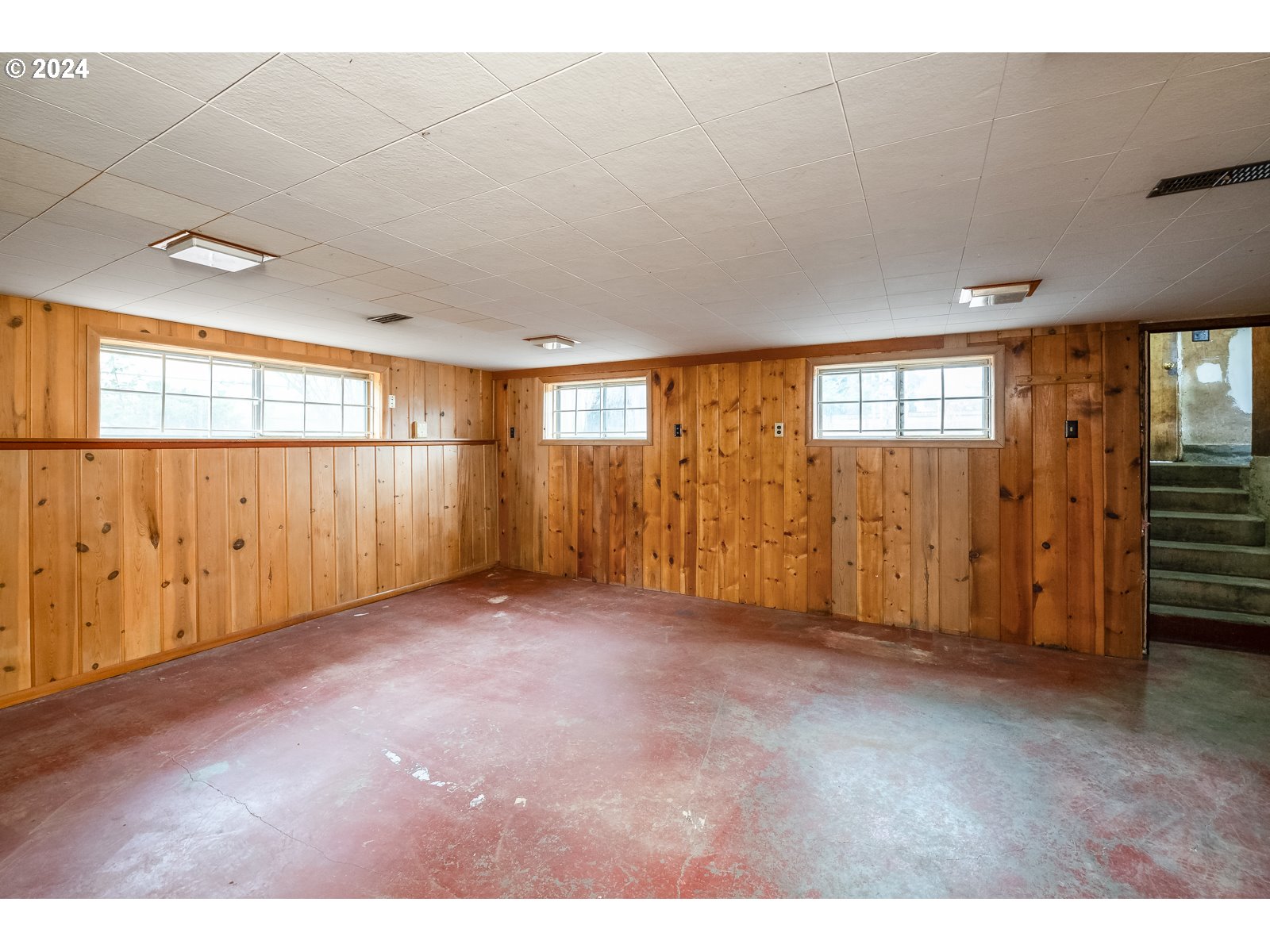 5232 Southeast Raymond Street Portland, OR 97206 - Photo 32 of 39 a view of an empty room with a window