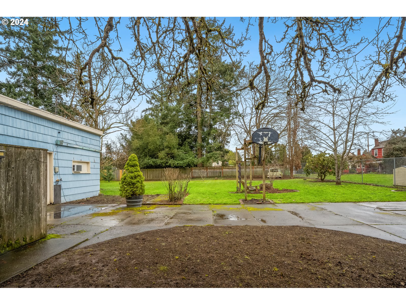 5232 Southeast Raymond Street Portland, OR 97206 - Photo 35 of 39 a view of road and trees in the background