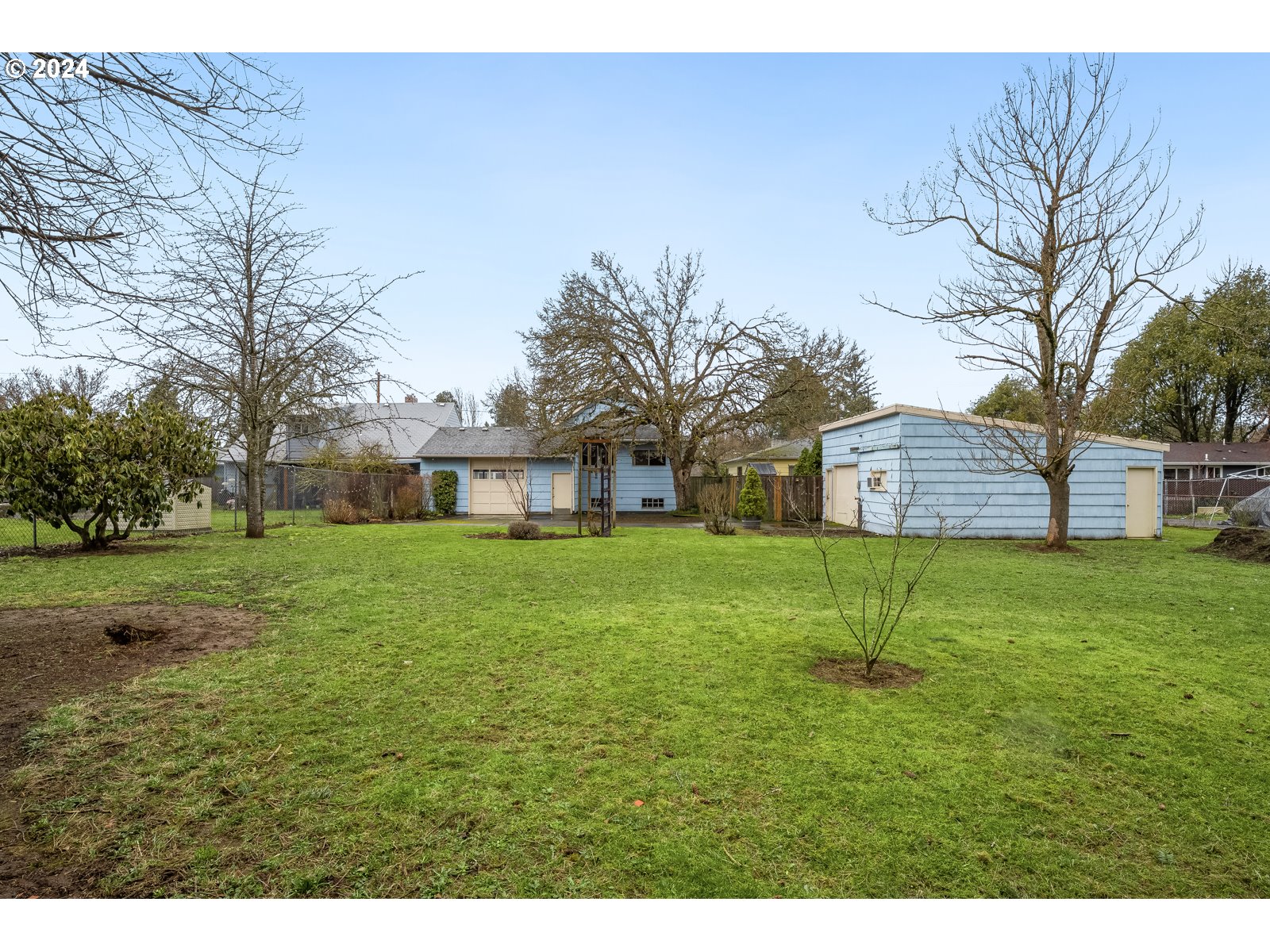 5232 Southeast Raymond Street Portland, OR 97206 - Photo 37 of 39 a view of a house with a yard