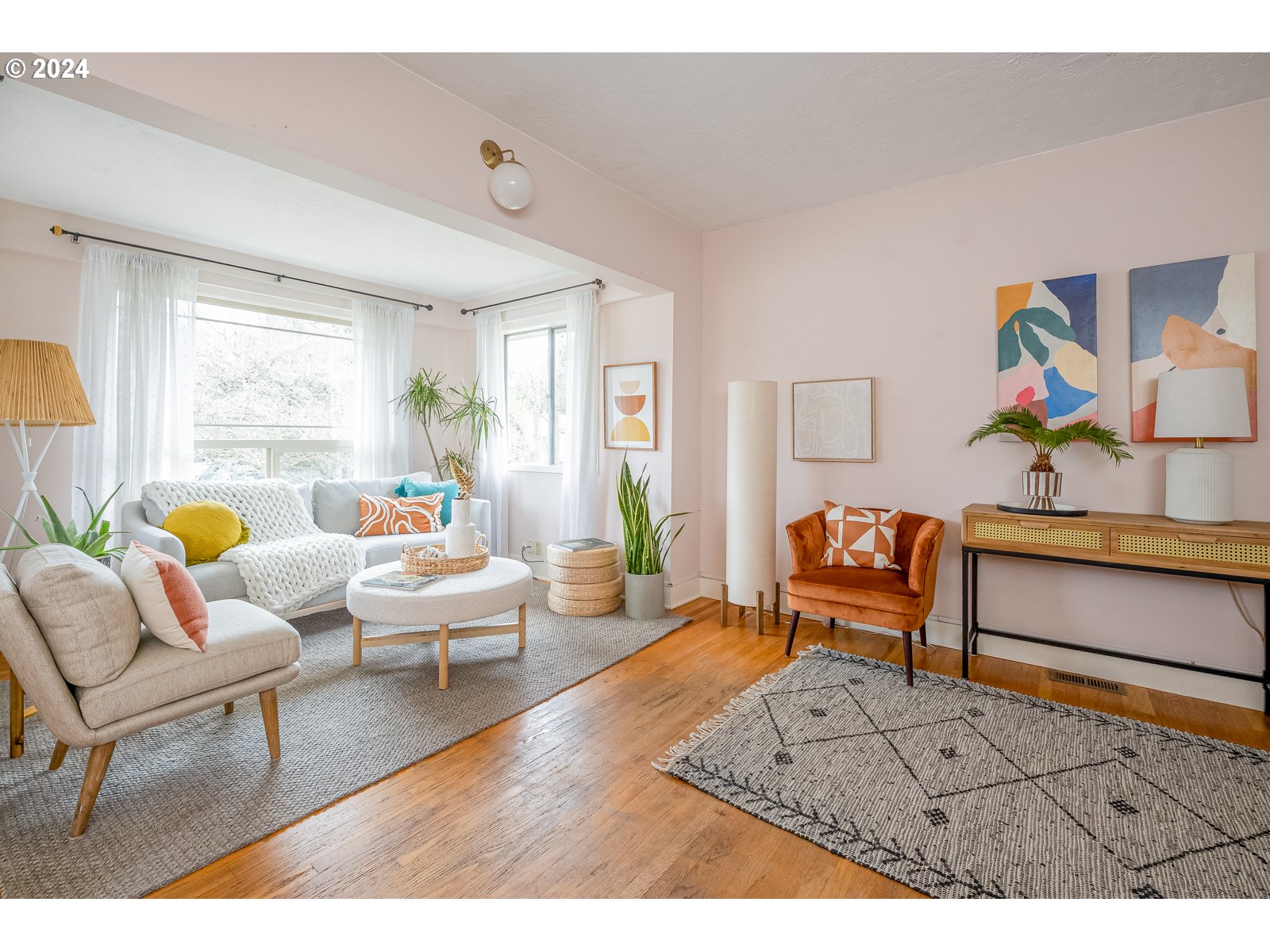 5232 Southeast Raymond Street Portland, OR 97206 - Photo 4 of 39 a living room with furniture and a wooden floor