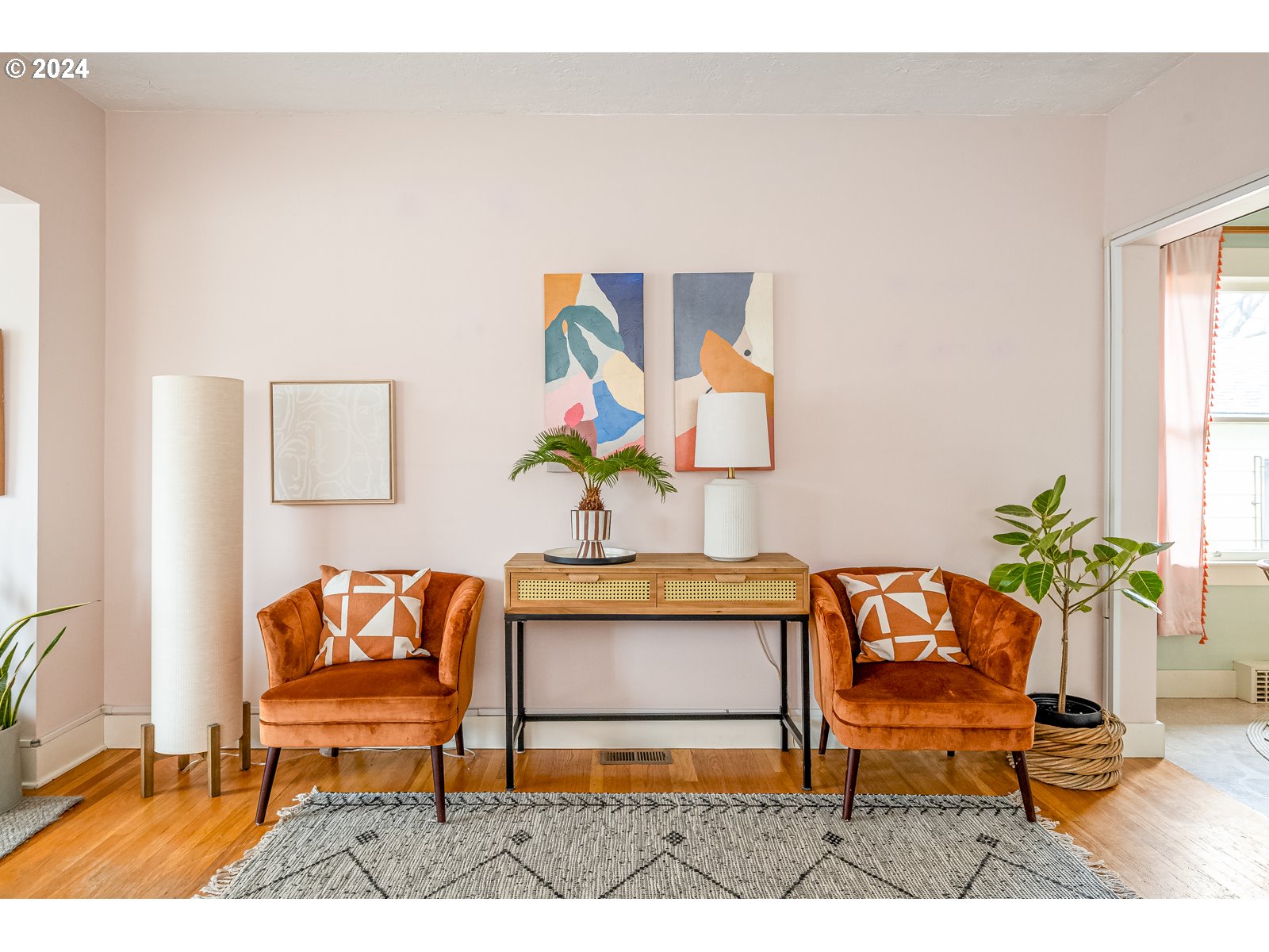 5232 Southeast Raymond Street Portland, OR 97206 - Photo 7 of 39 a living room with furniture and a potted plant
