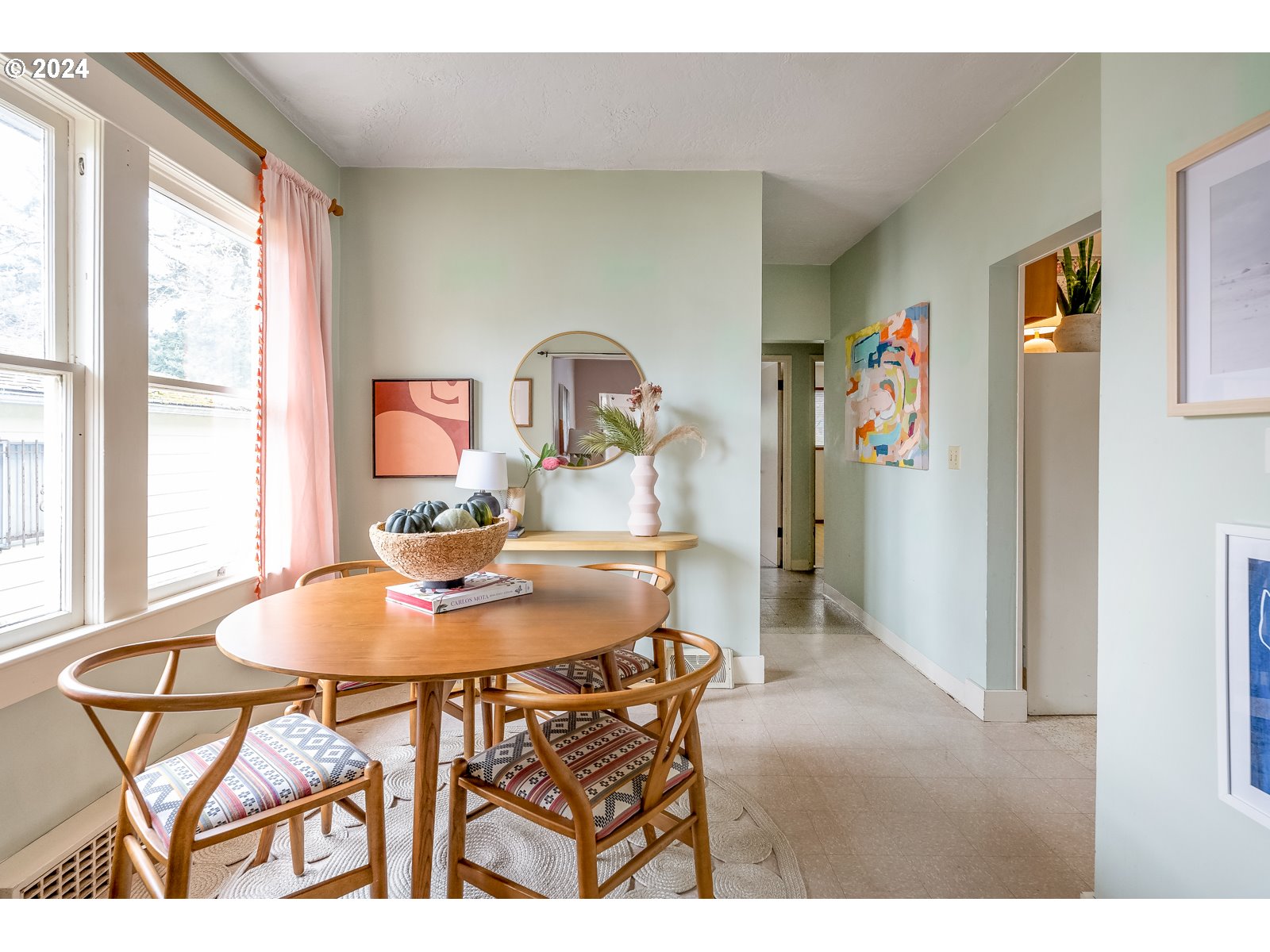 5232 Southeast Raymond Street Portland, OR 97206 - Photo 9 of 39 a view of a dining room with furniture and a window