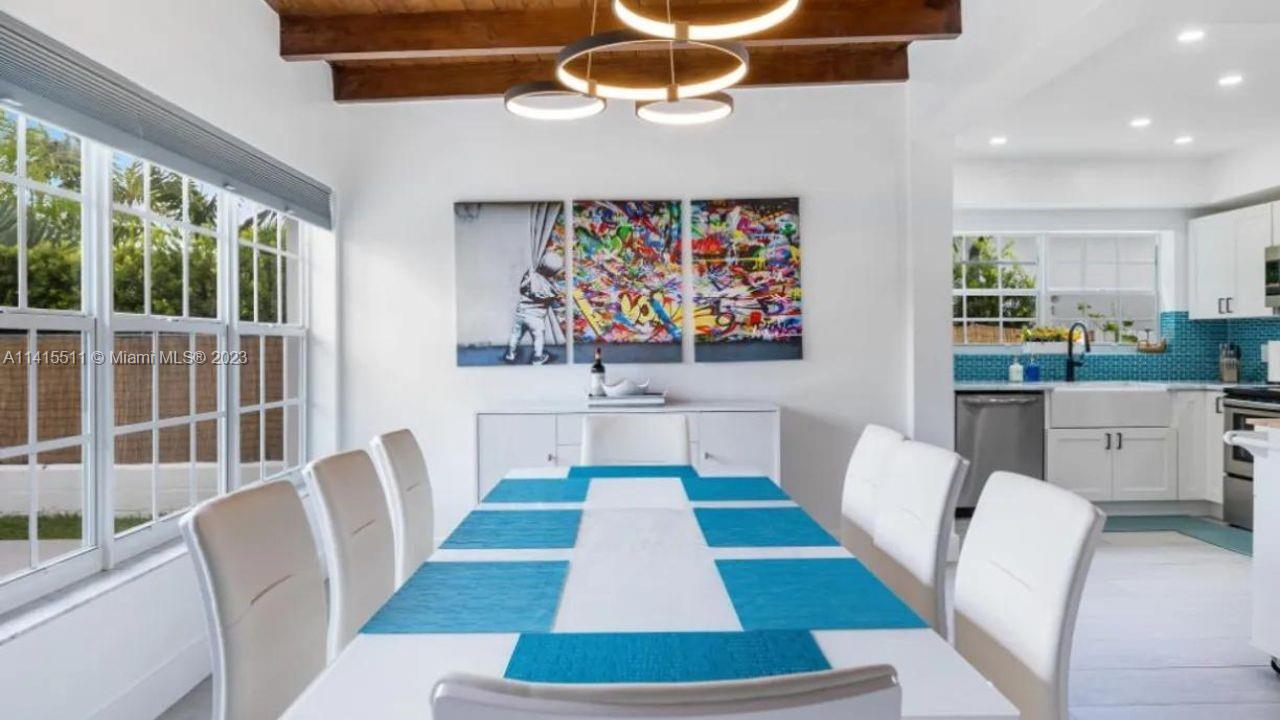 8926 Abbott Avenue Surfside, FL 33154 - Photo 5 of 5 a room with furniture and a rug