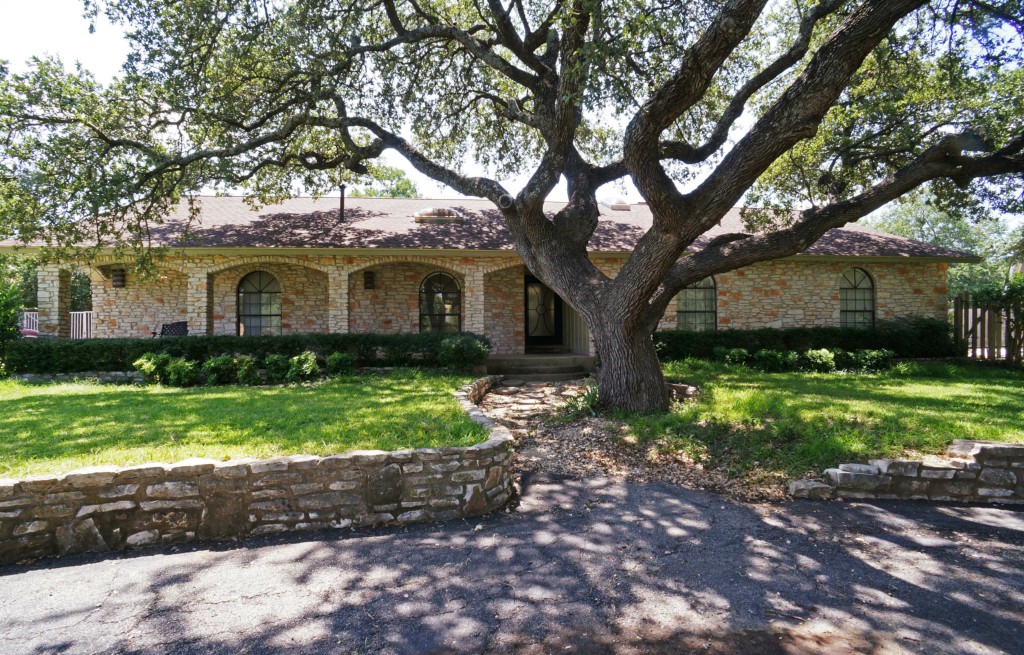 11305 D-K Ranch Road Austin, TX 78759 - Photo 1 of 1 a front view of house with yard and green space