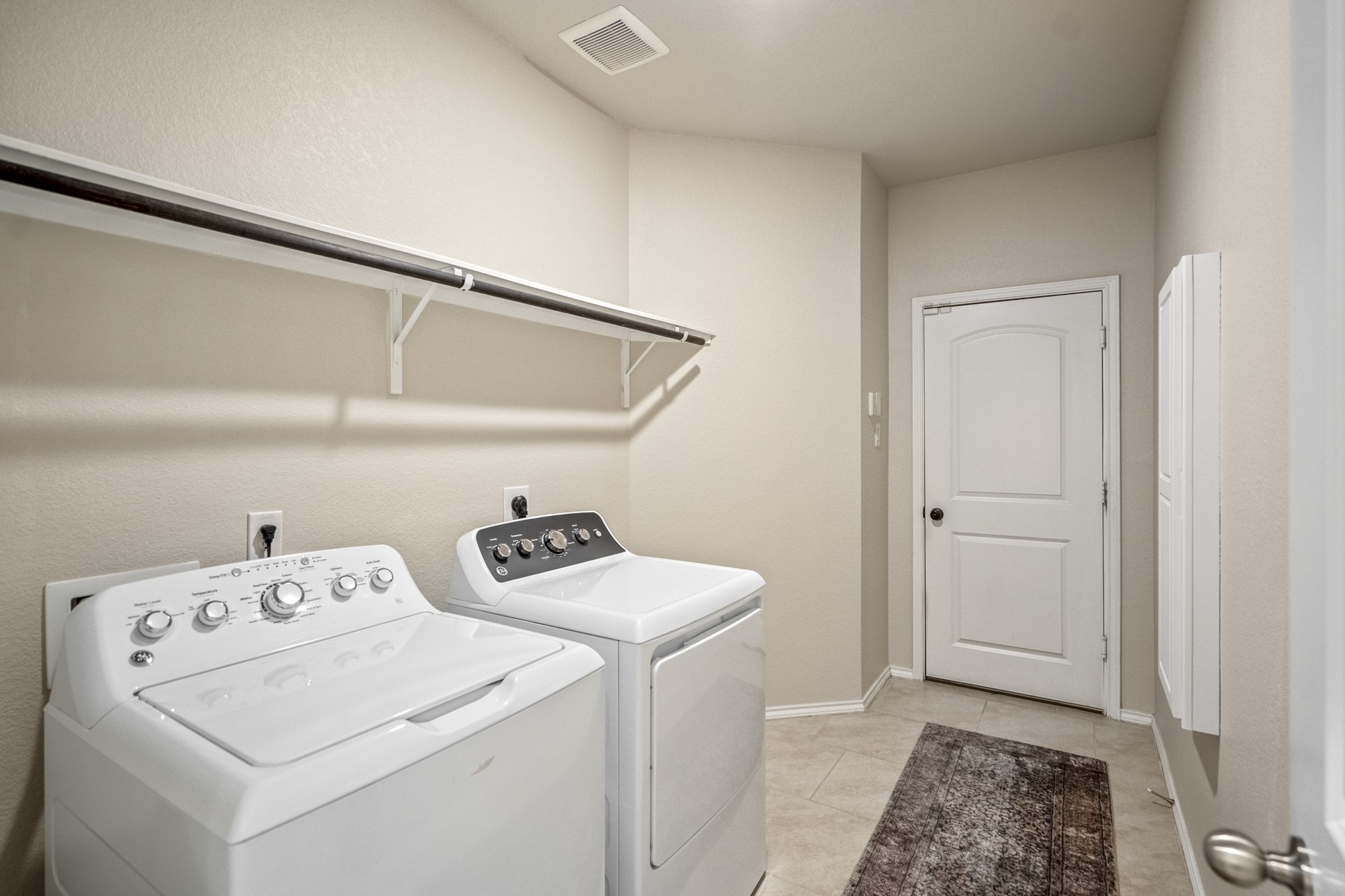 5522 Glenfield Spring Lane Spring, TX 77389 - Photo 27 of 46 Appreciate this spacious laundry room that leads to the garage.