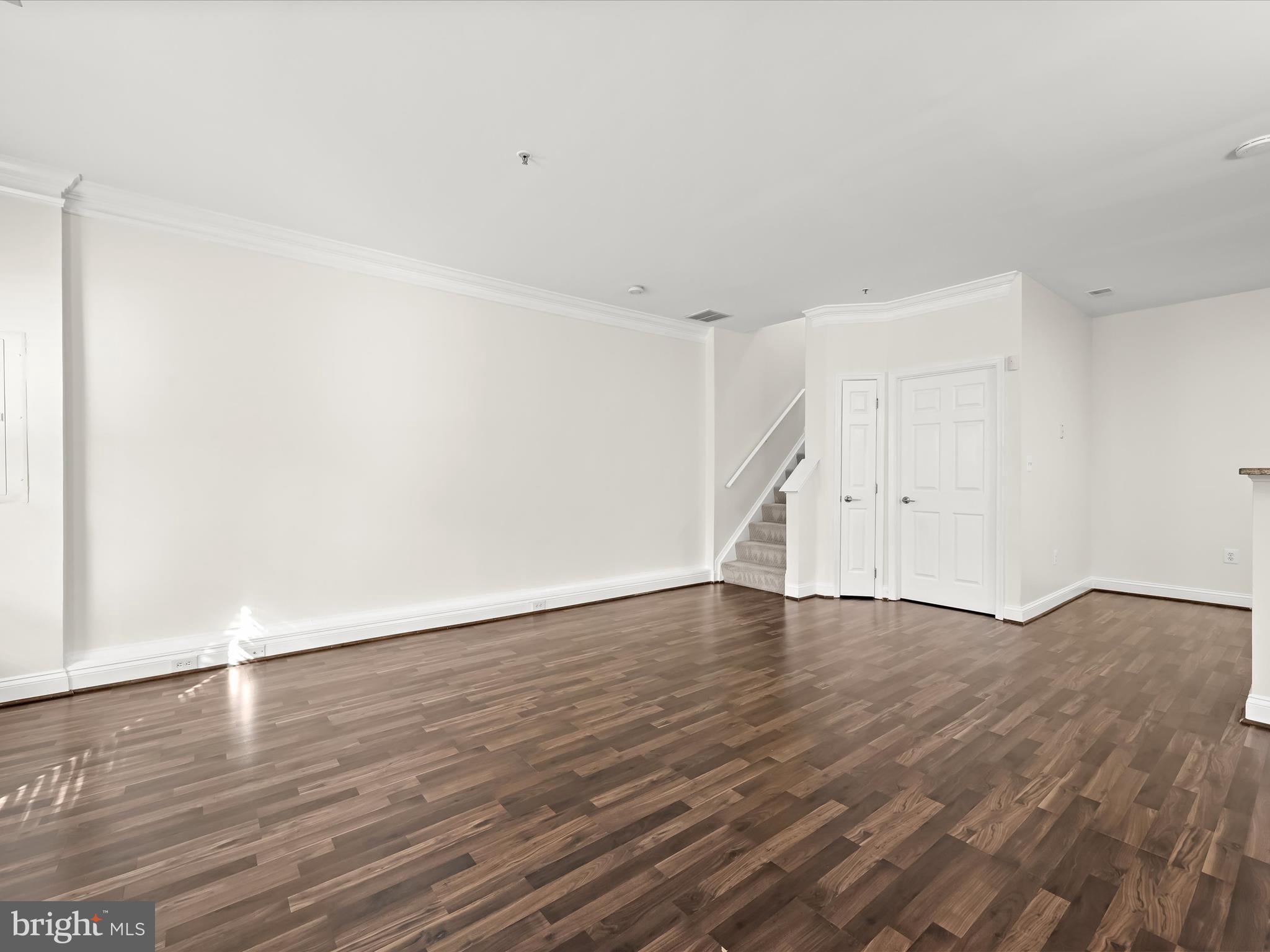 2711 Middle Neck Road Odenton, MD 21113 - Photo 11 of 42 a view of an empty room with wooden floor