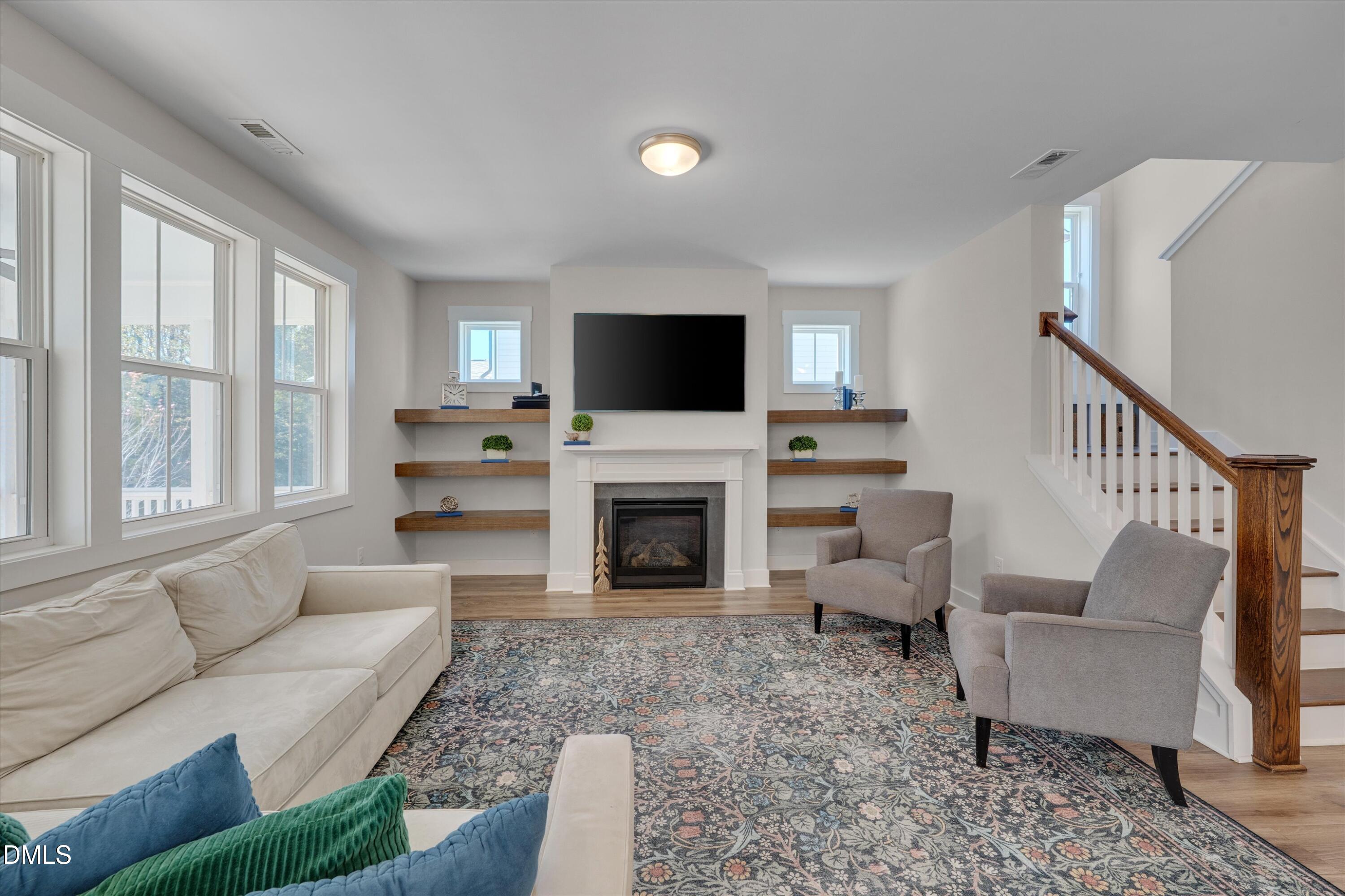 1709 Chestnut Falls Road Wendell, NC 27591 - Photo 8 of 31 Living Room w Gas Log Fireplace