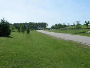 a view of a golf course with a lake