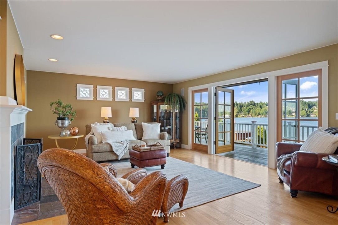 1707 Vernon Road Lake Stevens, WA 98258 - Photo 16 of 40 a living room with furniture large windows and wooden floor